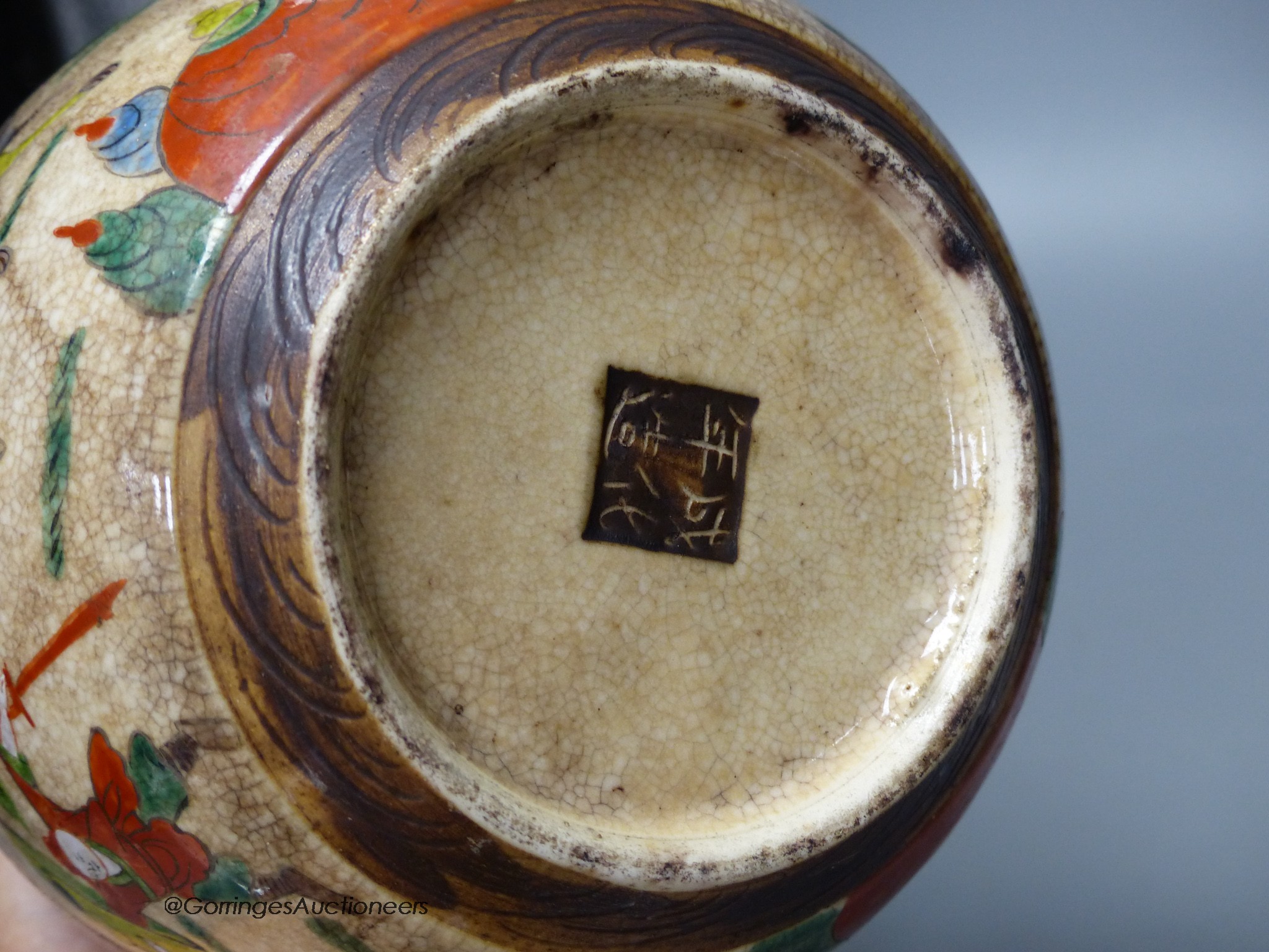 An early 20th century Chinese famille rose crackle glaze jar and cover, 20cm high